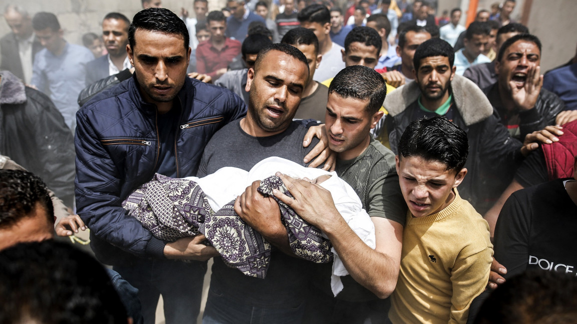 Palestinian mourners gaza baby getty