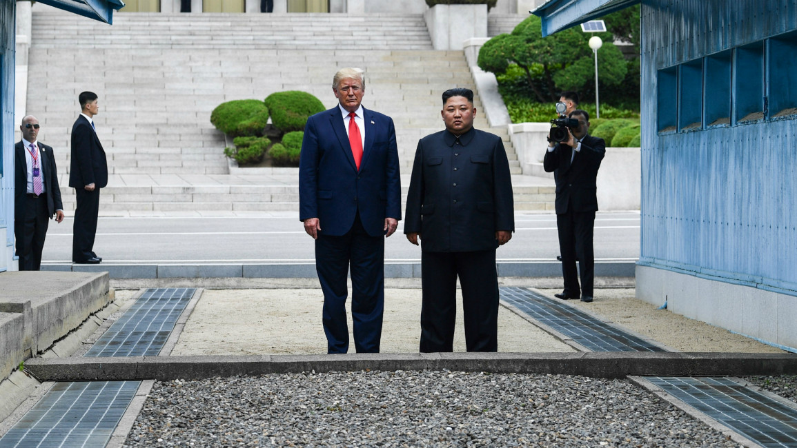 Trump, Jong -- AFP