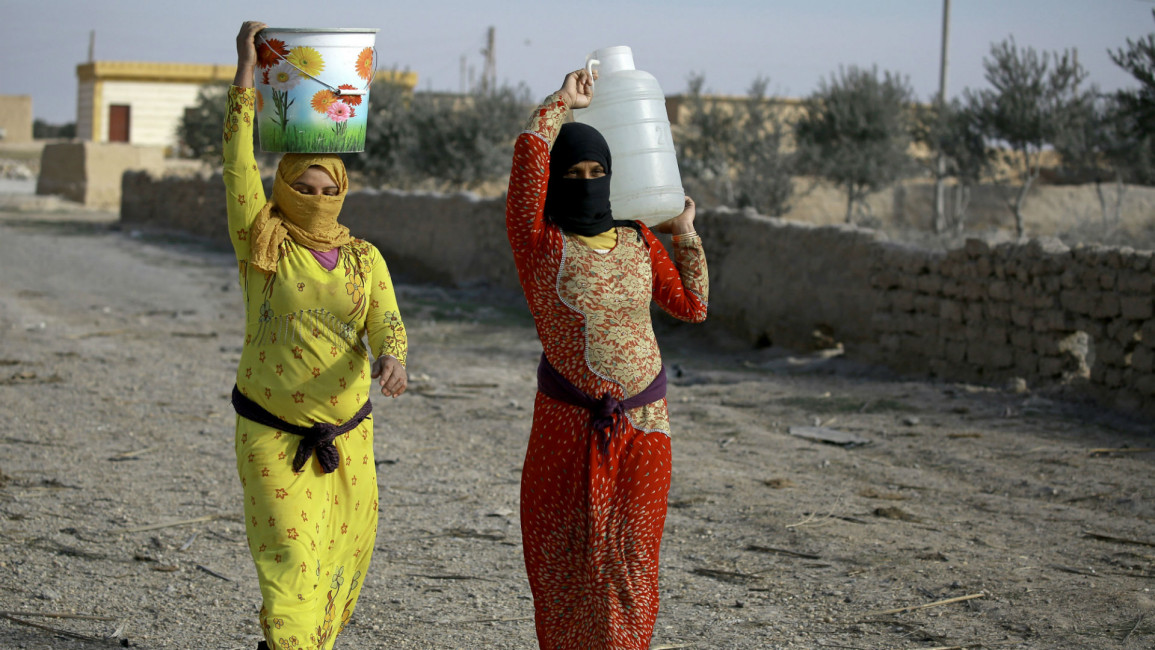 Syrian women in Raqqa [AFP]