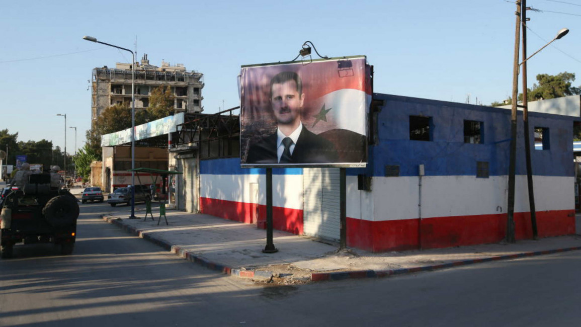 Assad poster - Getty