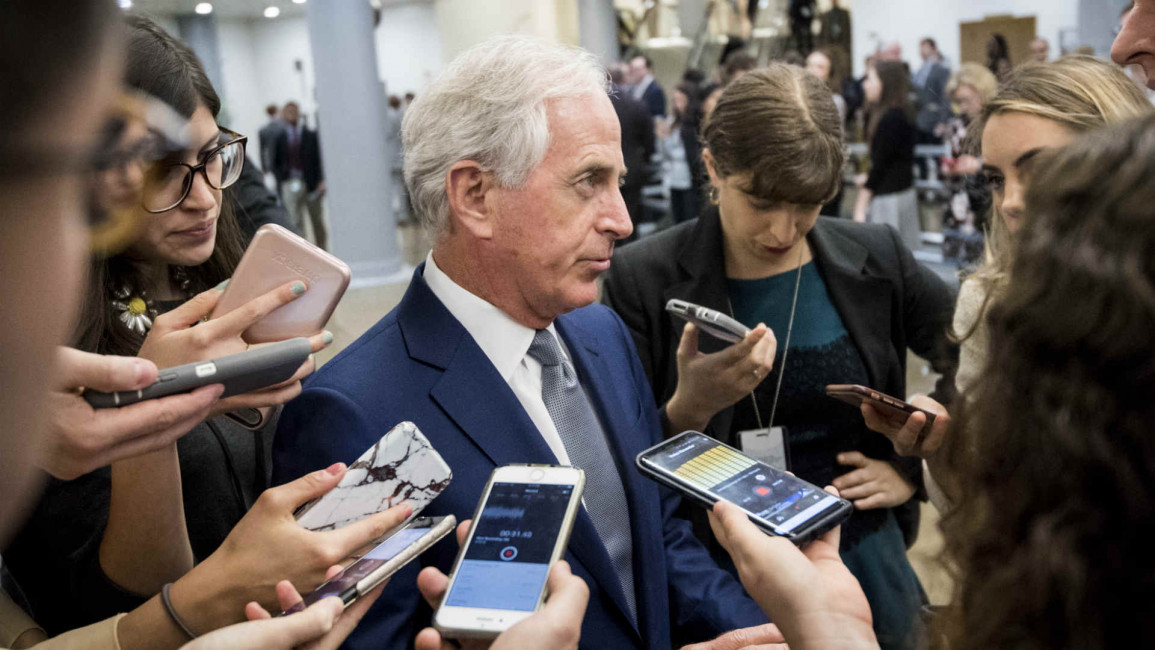 Bob Corker speaks with reporters after leaving Capitol Hill
