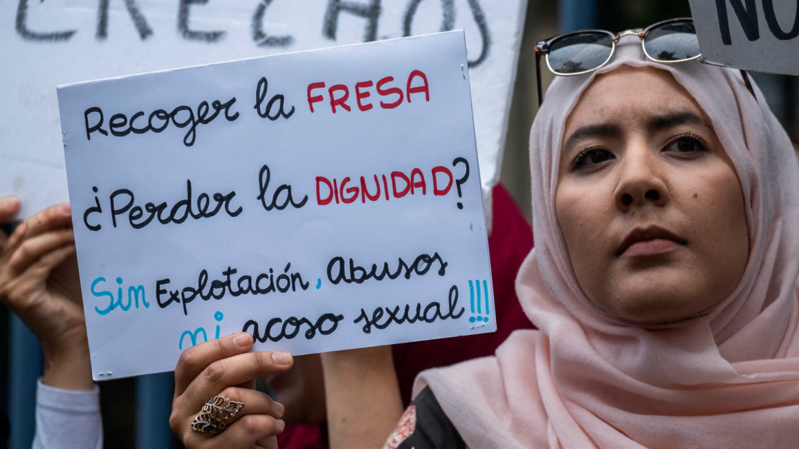  woman protesting working conditions in Spain Moroccan 