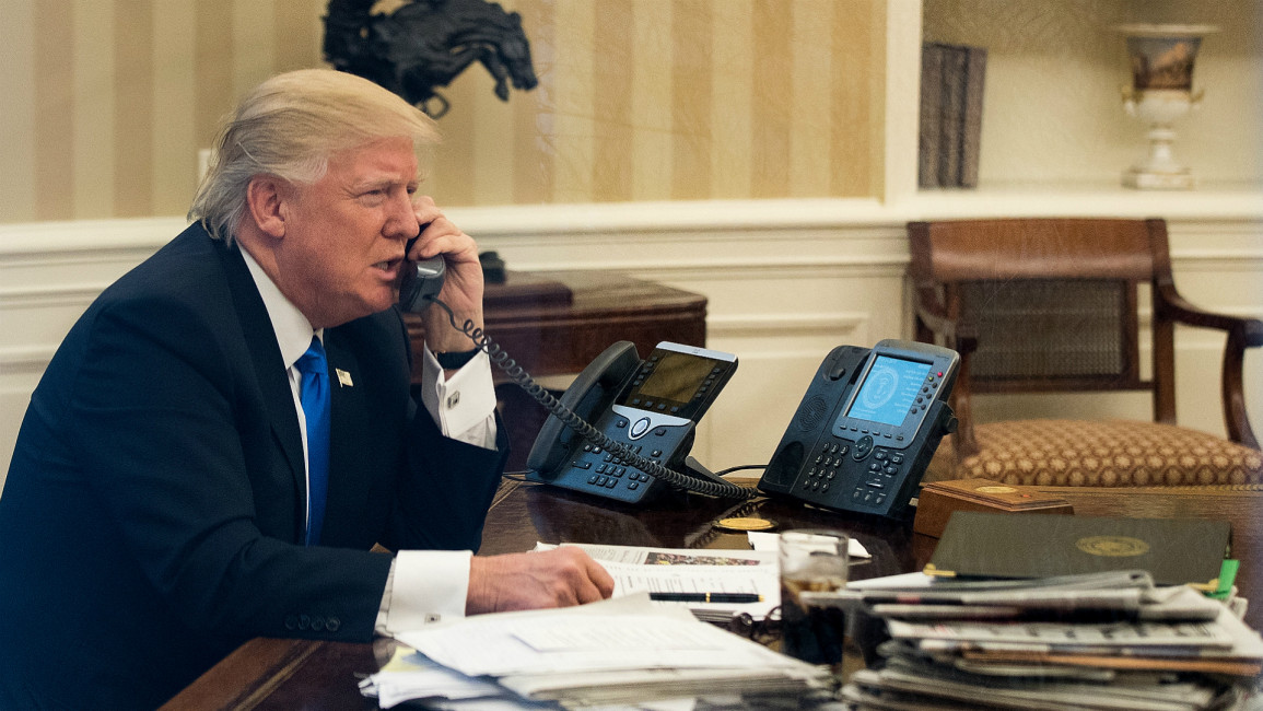 Trump on phone -- Getty