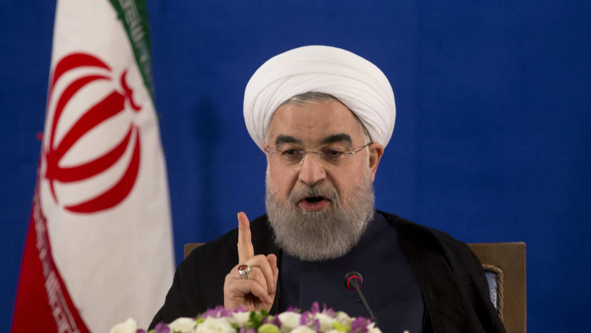 Rouhani wagging finger