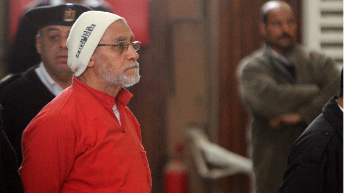 Mohamed Badie stands trial in Cairo