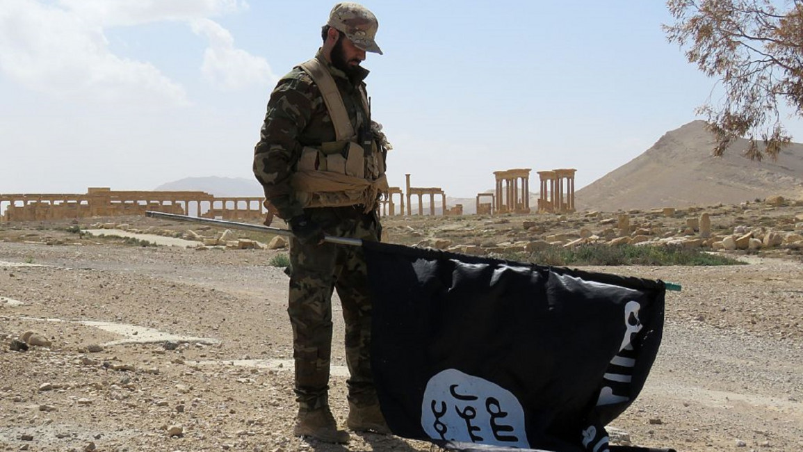 ISIS Flag Defeat AFP/GETTY