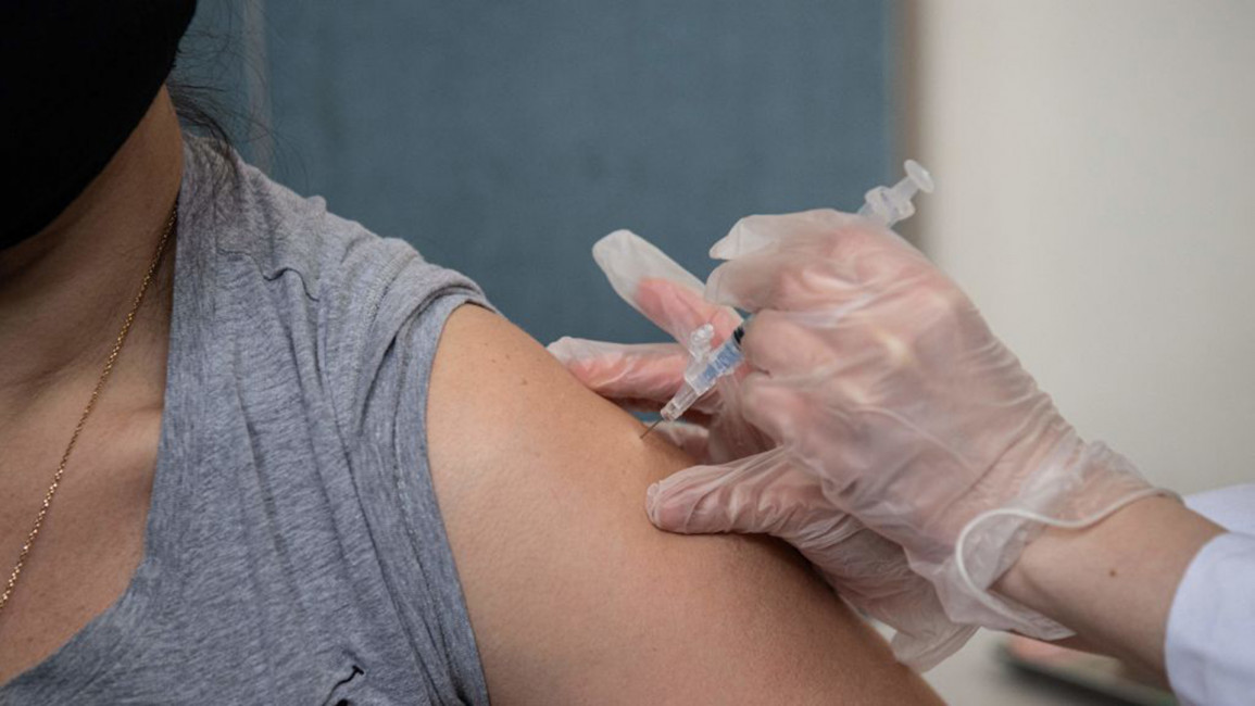 Covid-19 vaccine arm [Getty]