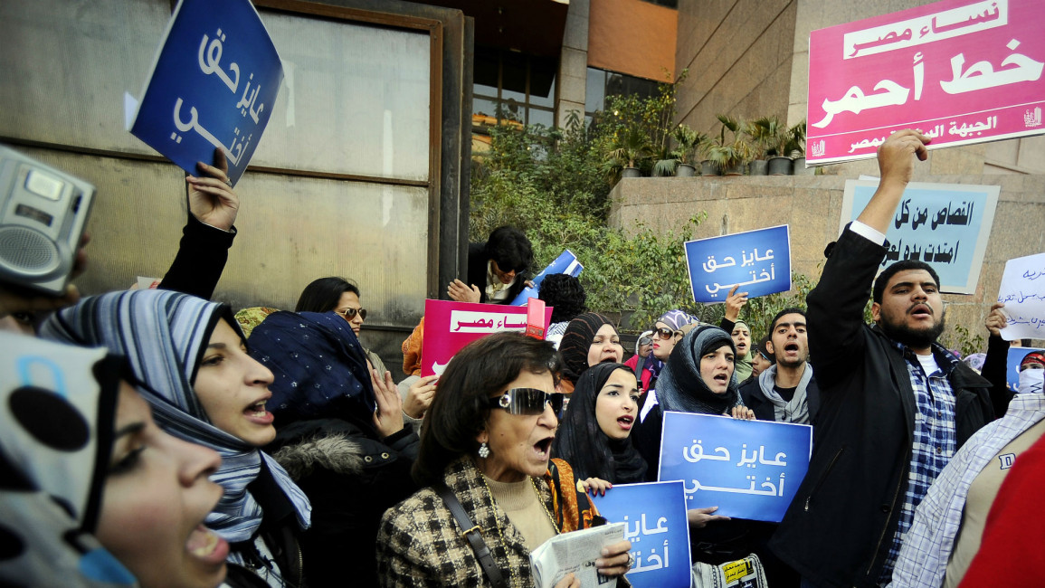 Egyptian women protest against virginity tests on women [AFP]