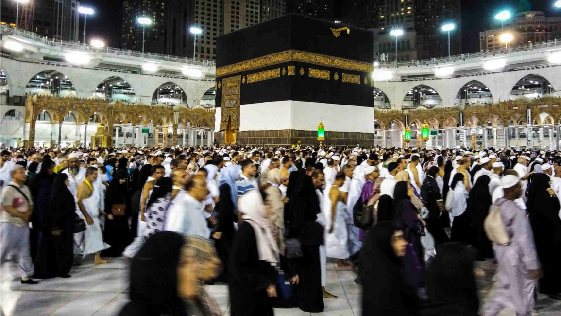 Muslims circle the Kaaba