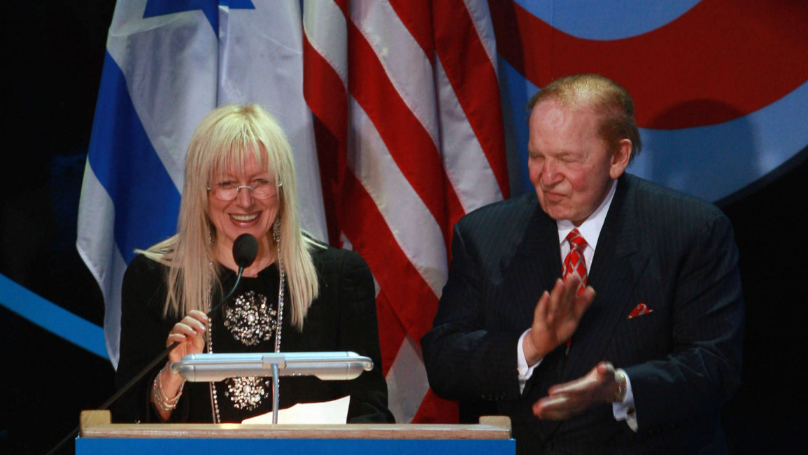 Sheldon Adelson and his Israeli-born wife at a conference