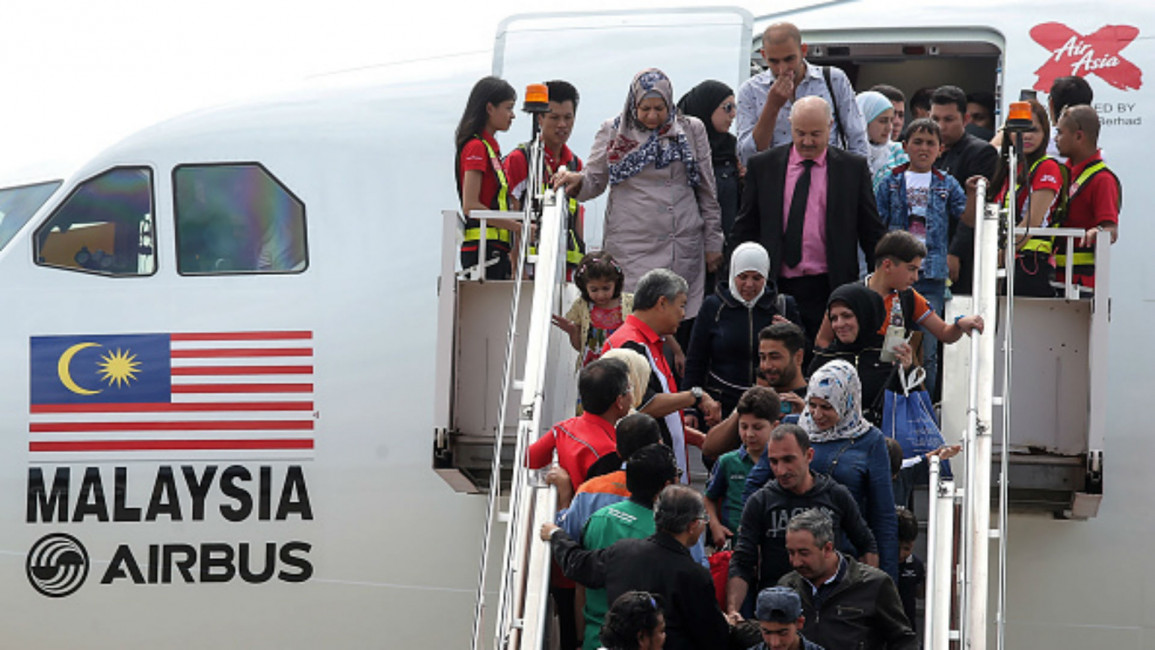 Malaysia receives Syrian refugees [AFP]