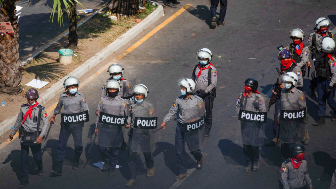 Myanmar police during an anti-coup protest [GETTY]