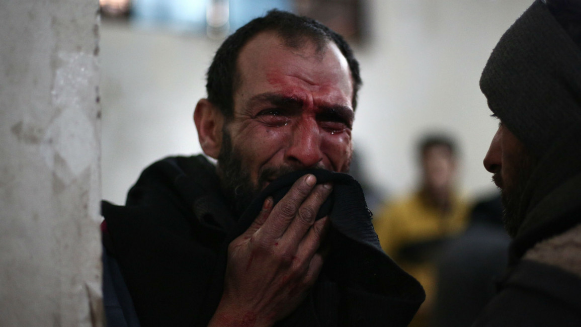Syrian man crying