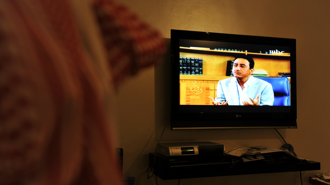 saudi arabia man watches tv AFP