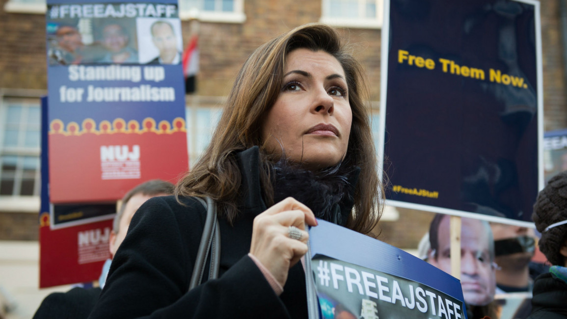 Free AJstaff protest in London (AFP)