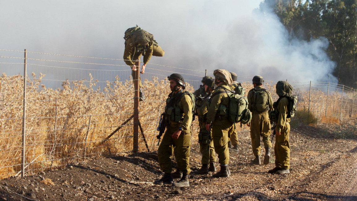 Israeli soldiers rocket attack AFP