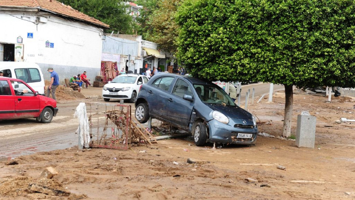 Car stuck on a post in Algeria [GETTY]