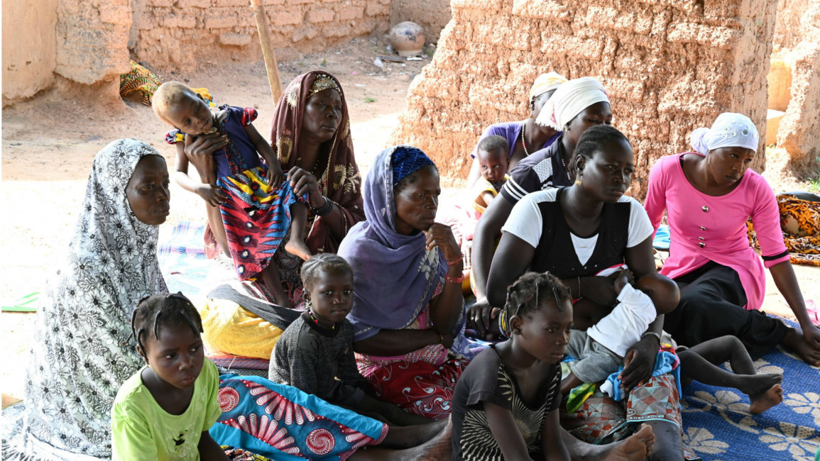 Burkinabe refugee women and children [Getty] 