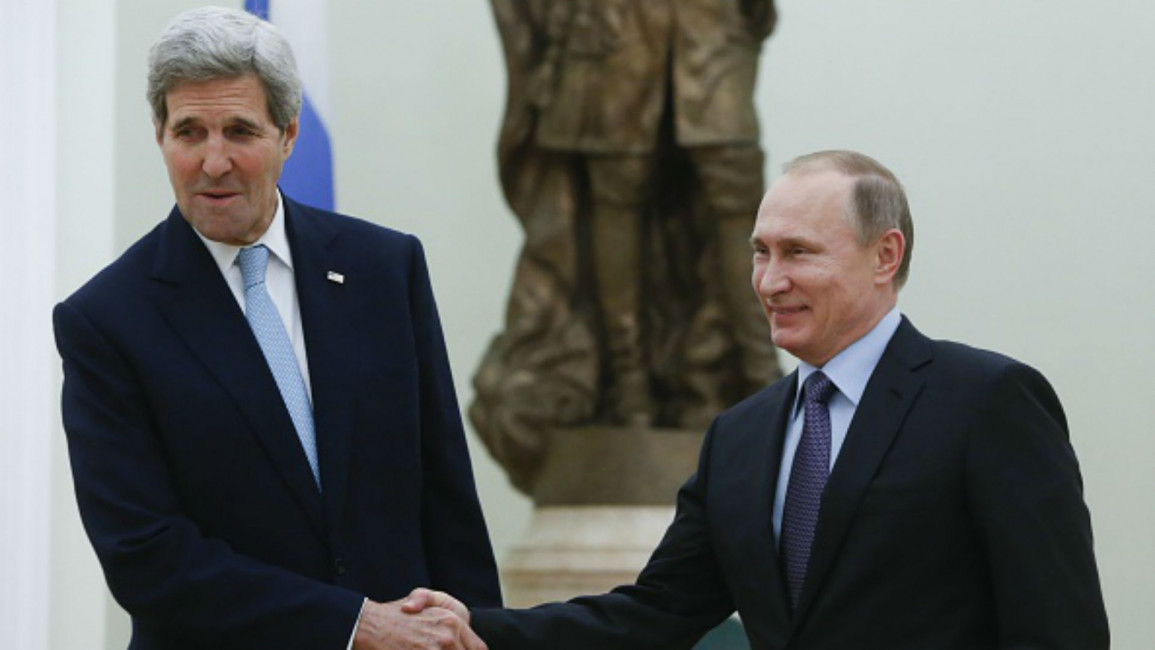 Kerry and Putin [AFP]
