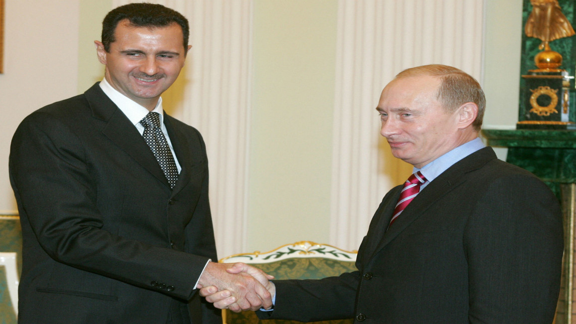 Assad Putin - AFP