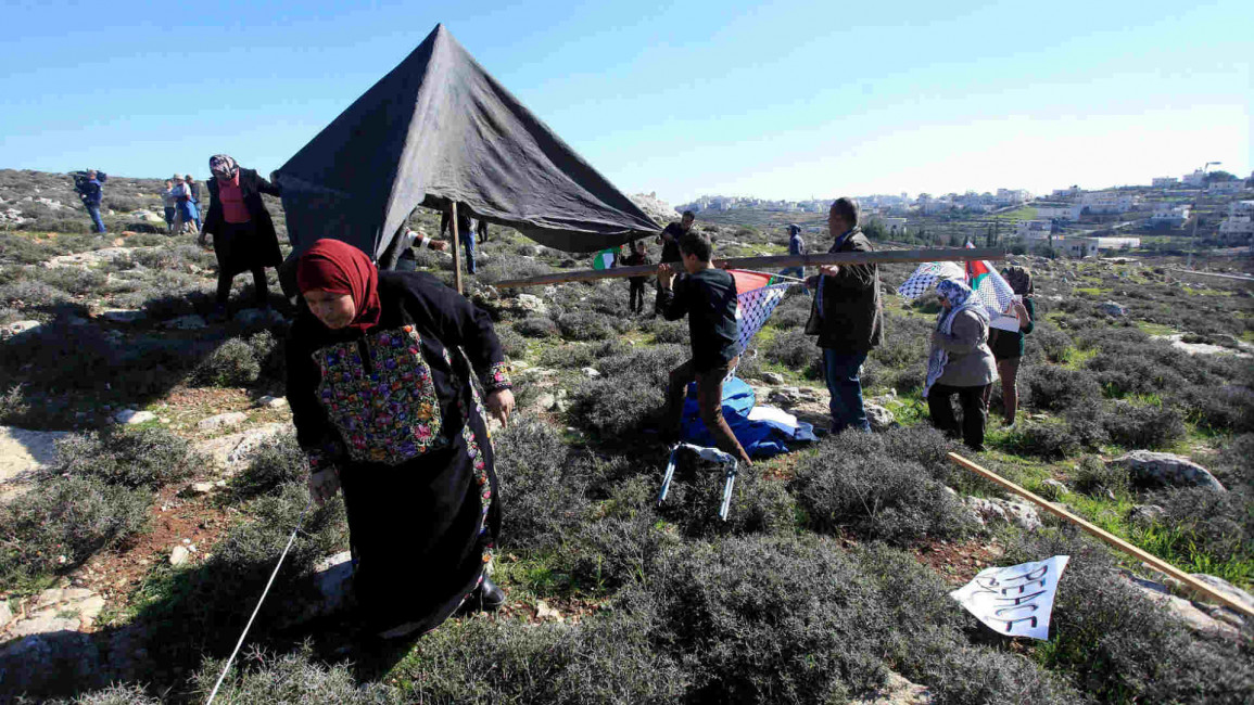 Palestinians pitch a protest test