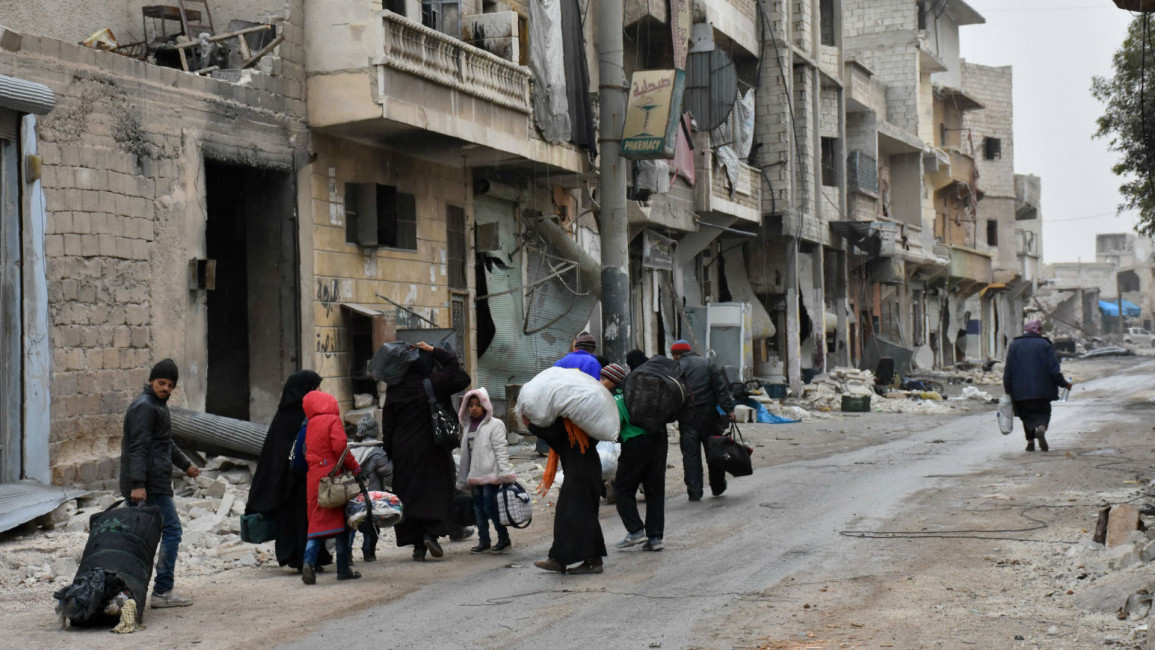 Civilians flee eastern Aleppo [AFP]