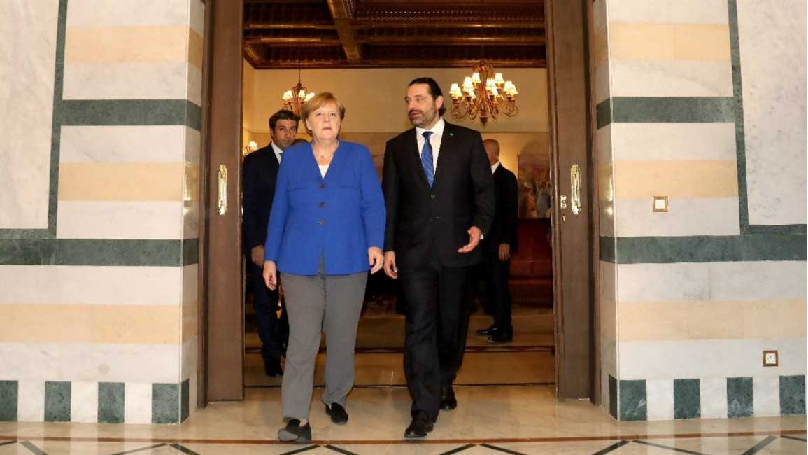 Merkel and Hariri [Getty]
