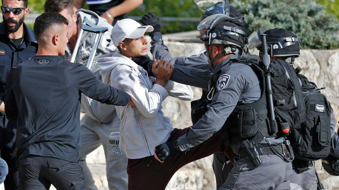 Israeli soldiers attack Palestinian protesters in Jerusalem [Getty]