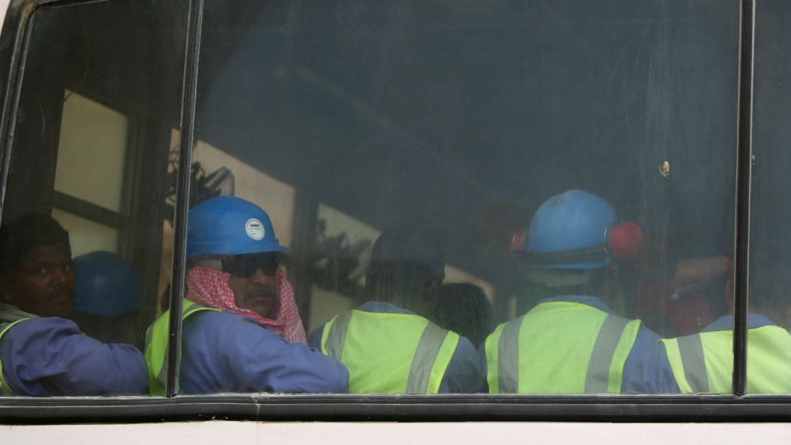 Qatar workers -- AFP