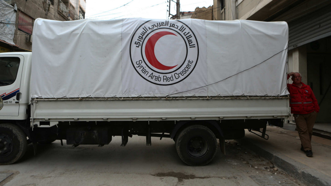  Douma A Red Crescent employee waits in 