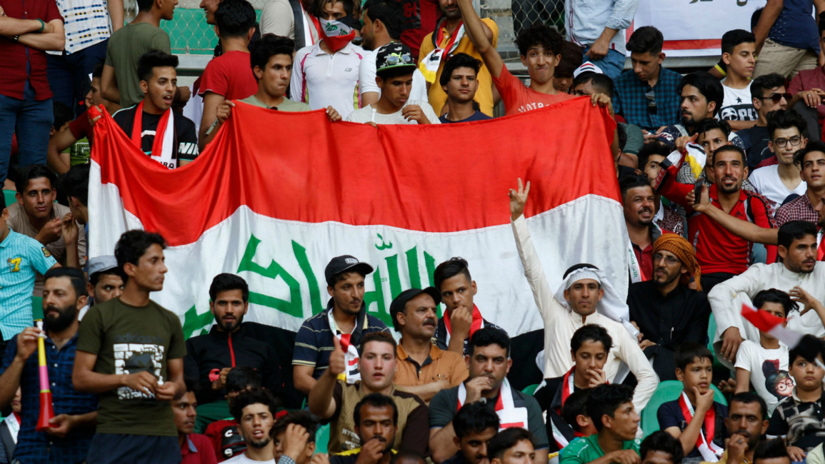 Iraq football fans -- AFP