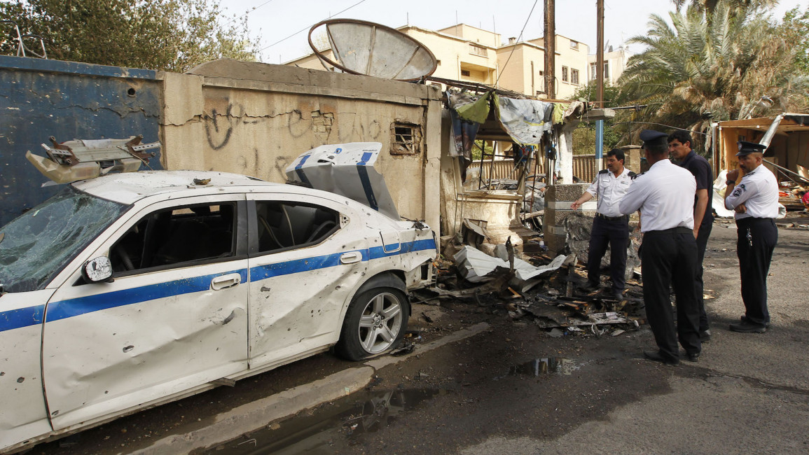 Iraq Baghdad explosion police station AFP