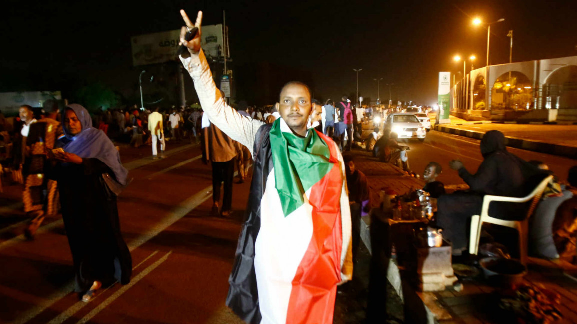 sudan flag man - getty
