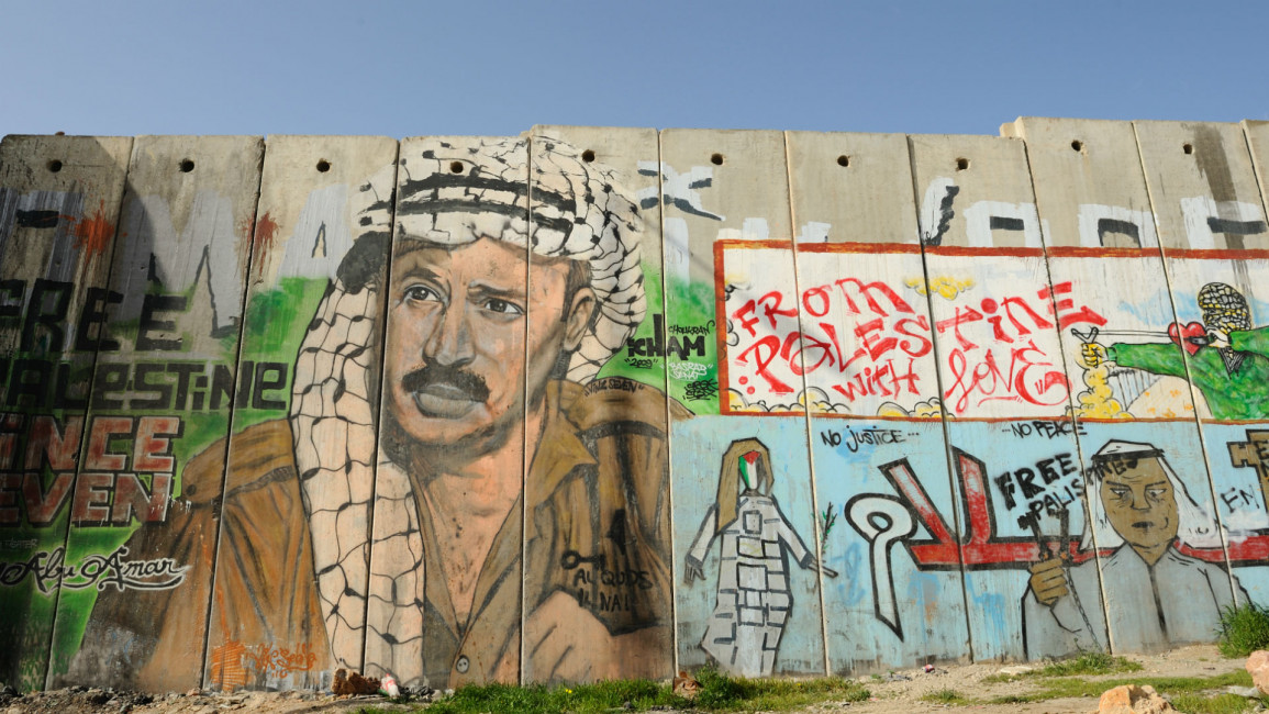 Arafat graffiti separation wall - Getty