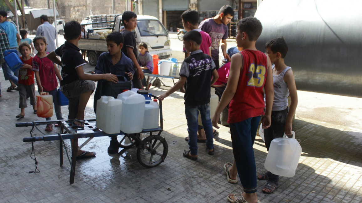 Syria Aleppo water collection ANADOLU