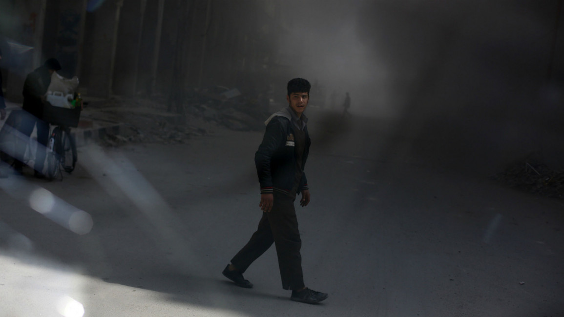 Douma airstrikes [AFP]