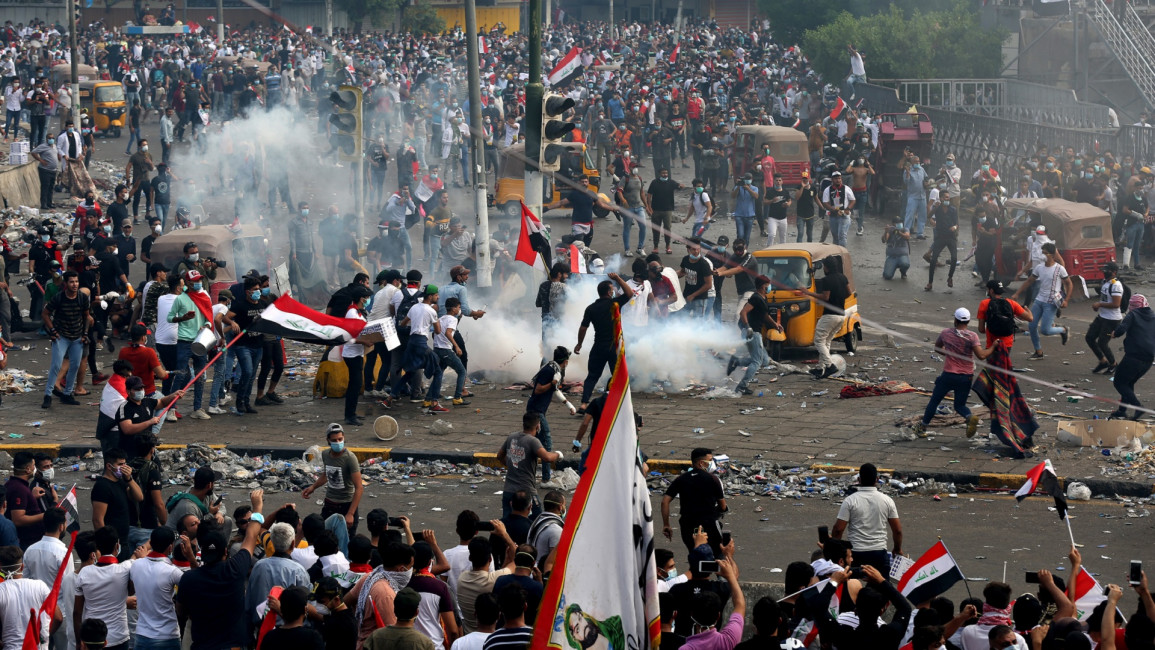 iraq protest tear gas