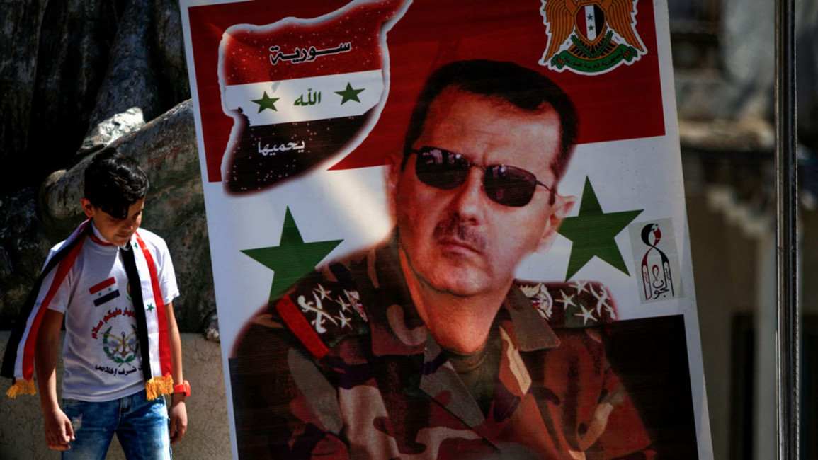 Assad poster1 [Getty]