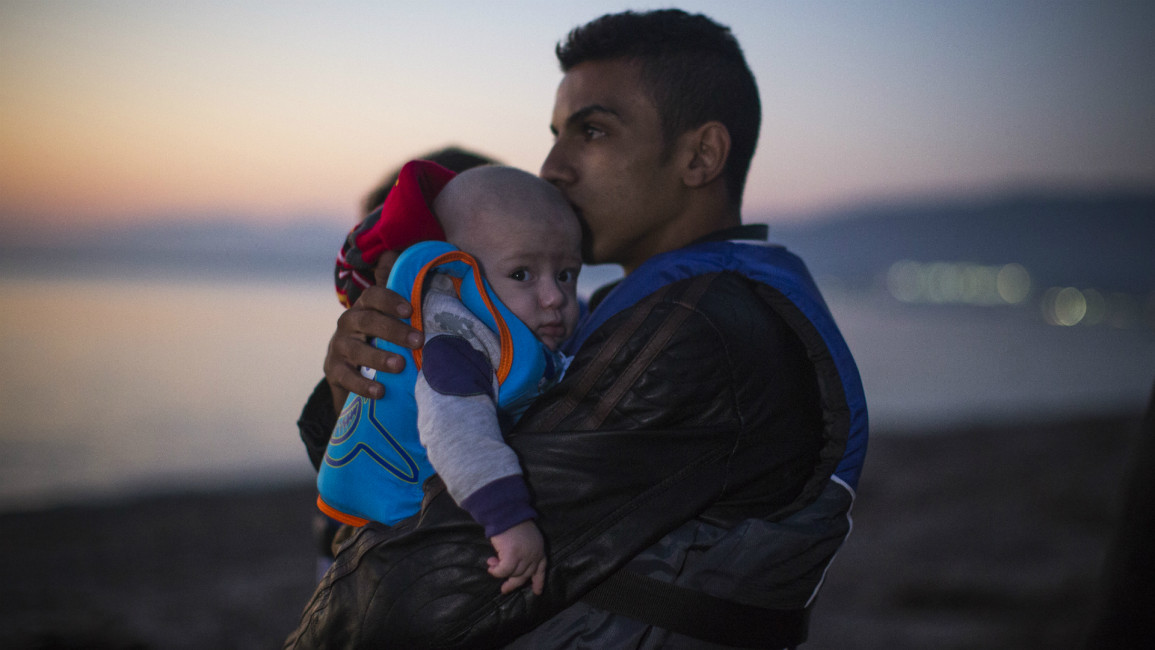 Syrian man and child -- Getty