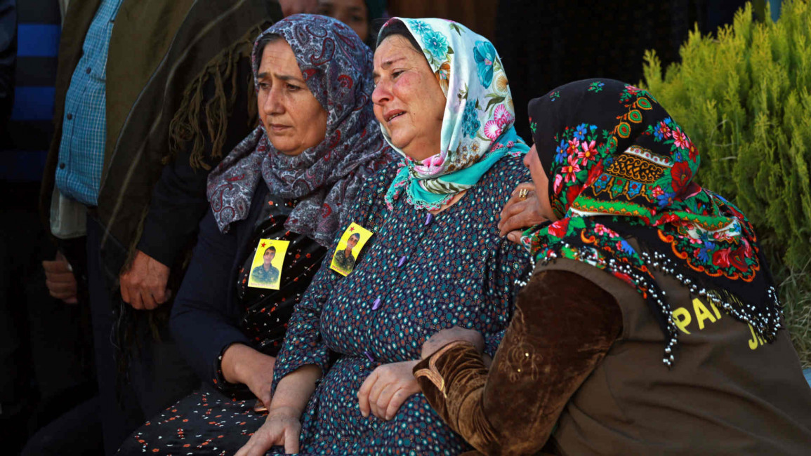 Syria women mourning SDF - Getty