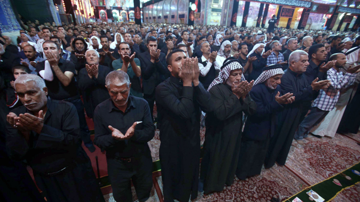 Iraq Karbala Shia praying Englishsite AFP