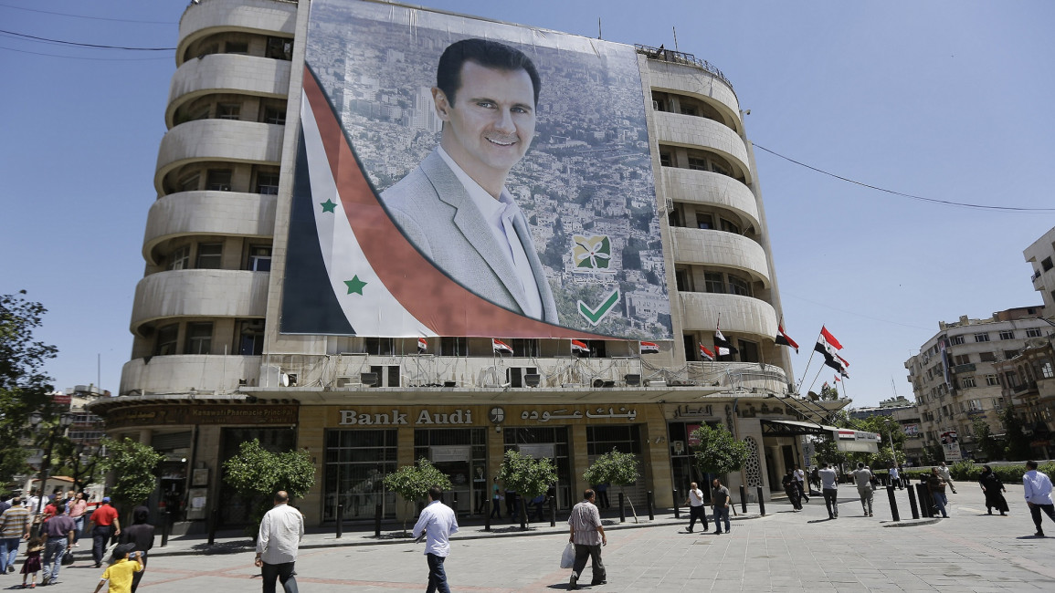 Assad civil servants afp