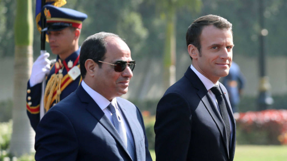 Macron and sisi - AFP