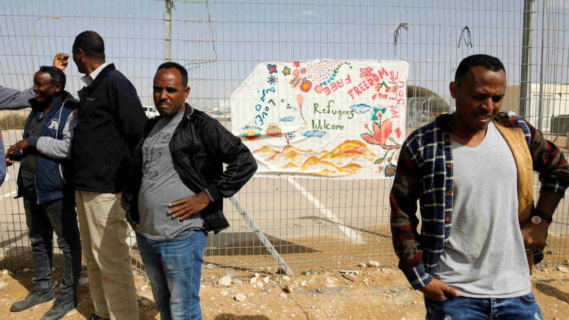 African migrants next to Holot detention centre in Israel