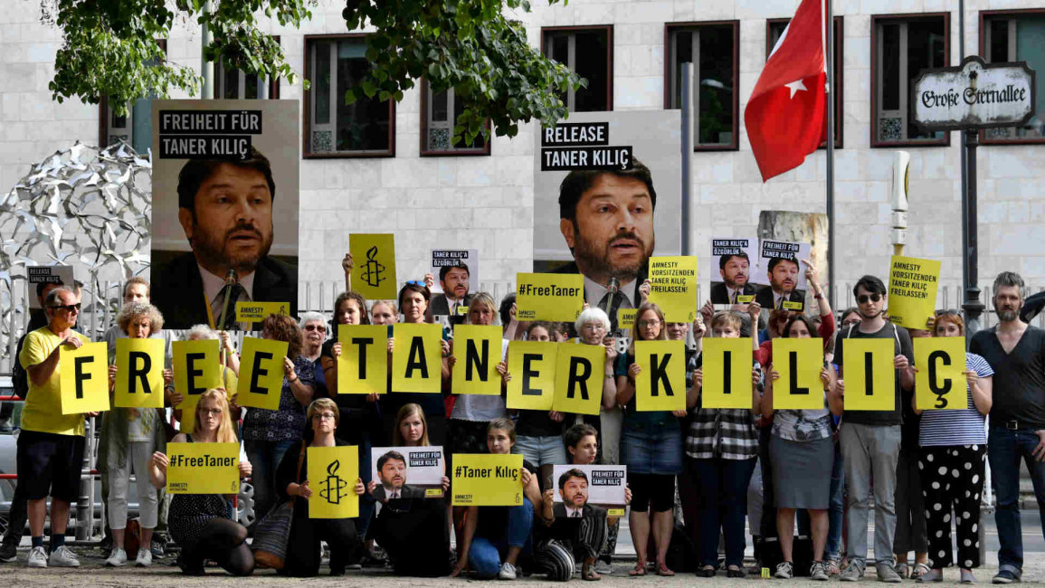 Activists stage a protest at Turkish embassy