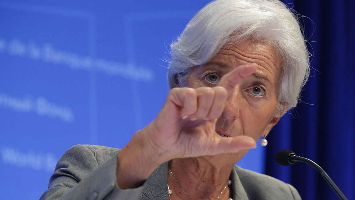 Christine Lagarde answers reporters questions