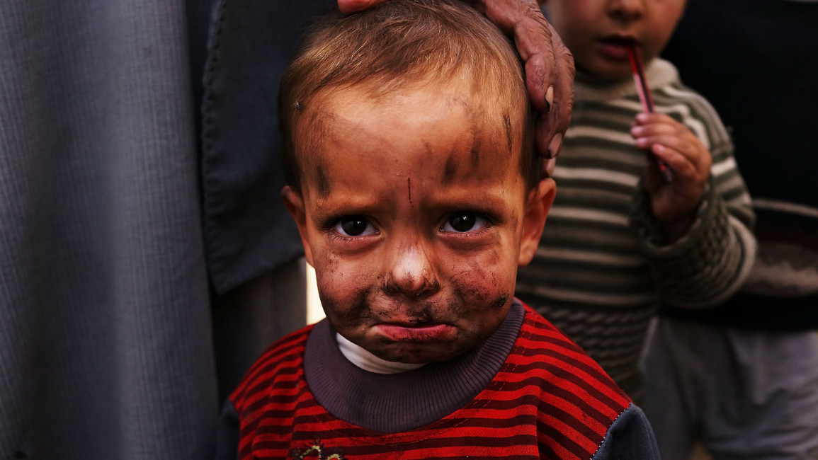 Syrian refugee boy [Getty]