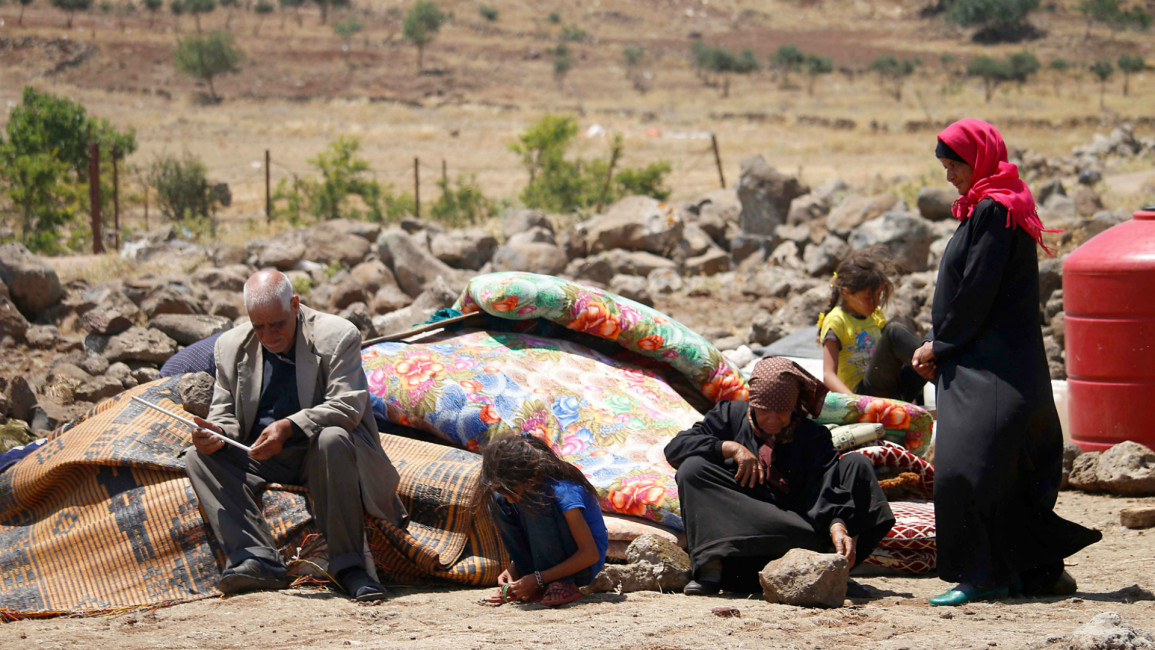 Civilians fleeing Daraa [Getty]