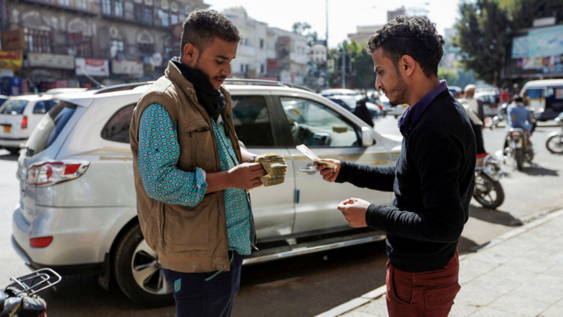 Yemenis currency exchange - AFP