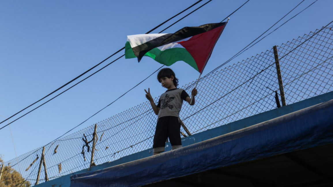Palestinian boy flag - Getty